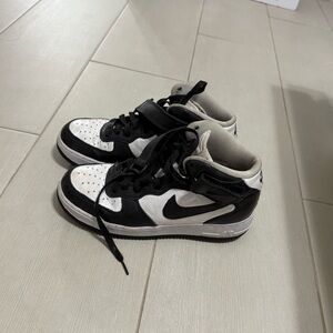 Black and White High-Top Nike Sneakers